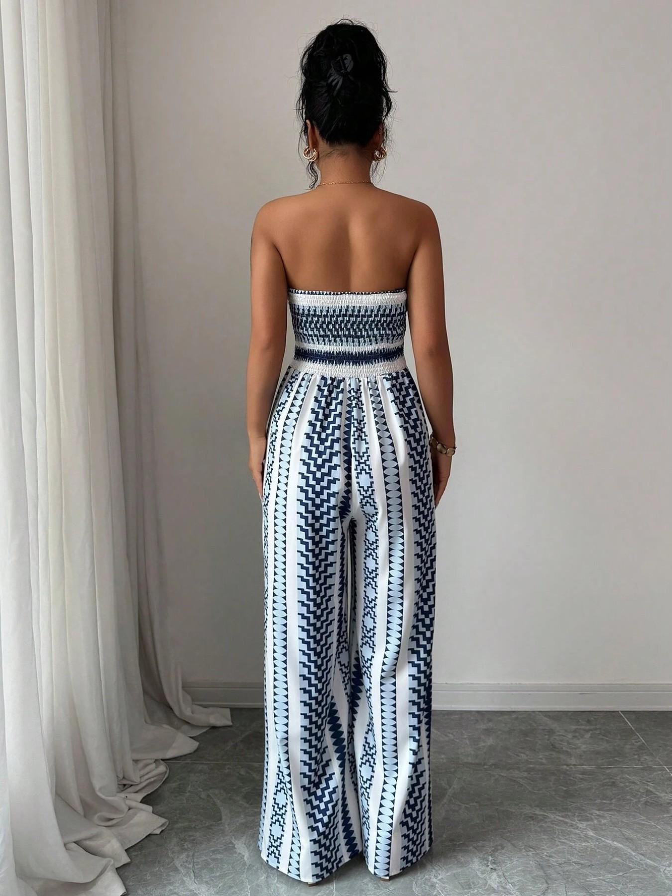 👗💙 Geometrisk jumpsuit med halterneck och slits i sidan – 50 % RABATT! Perfekt för stranden, kontoret och kvällen. 🔥✨