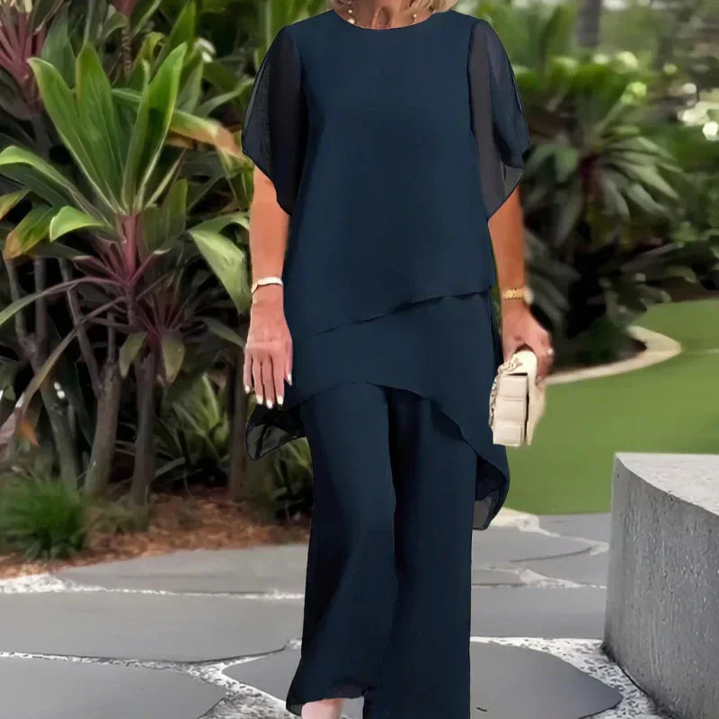 ✨60% RABATT – Charmigt set med oregelbunden topp 👗 Elegant set med vida byxor – Bekväma och perfekta för våren
