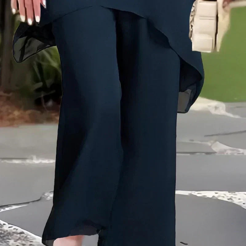 ✨60% RABATT – Charmigt set med oregelbunden topp 👗 Elegant set med vida byxor – Bekväma och perfekta för våren