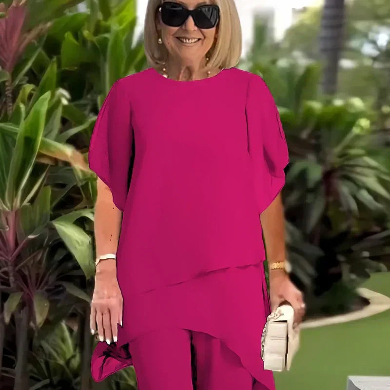 ✨60% RABATT – Charmigt set med oregelbunden topp 👗 Elegant set med vida byxor – Bekväma och perfekta för våren