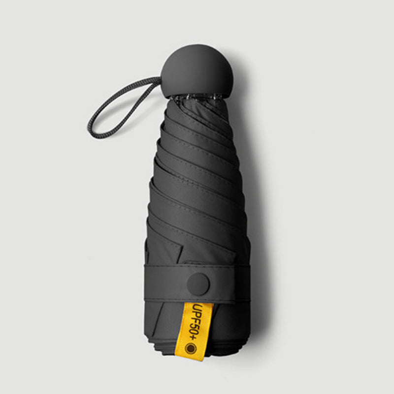 Bärbart kapselparaply med dubbel funktion