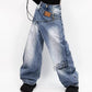 Damjeans med asymmetrisk midja och vida ben